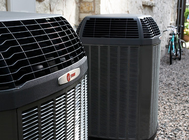 Trane-Air-Conditioners-on-Side-of-House-